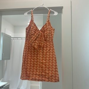 Orange bow tularosa dress